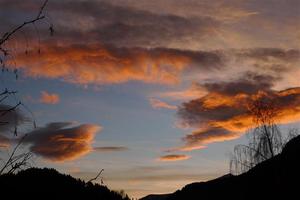 Sunset with orange tinged clouds