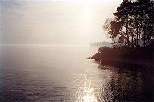 Lake in white noon light 