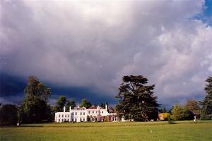 sun on school, south lawn, heavy cloudy sky, intense colours, great picture needs cropping