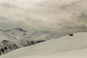 Hut, snow and clouds