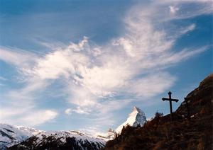 Matterhorn, cross and clouds