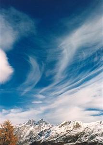 Cloud strokes over mountains