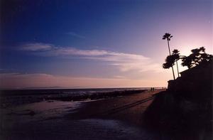 Pink sunset, blue sky and ocean