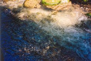 Close up of water ripples and wave-interferences