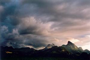 Clouds and setting light over Ruebli and other