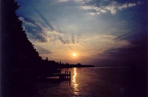 Sunrise over pier and bay